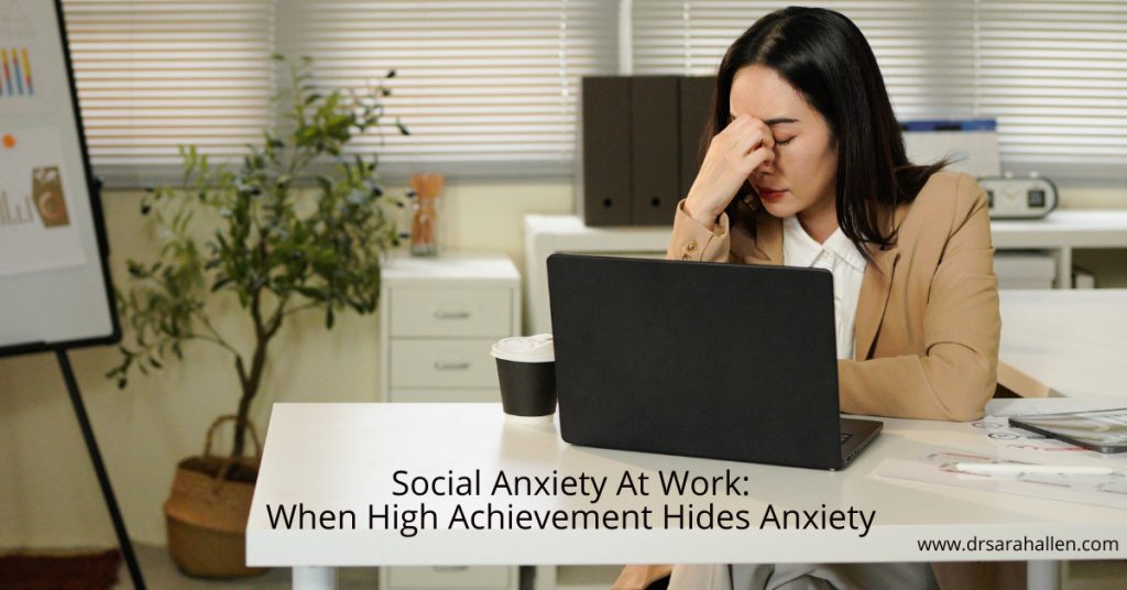 high achieving woman at work feeling social anxiety