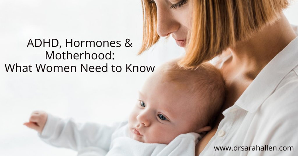 Mother with ADHD holding baby and thinking how her ADHD symptoms feel overwhelming since motherhood